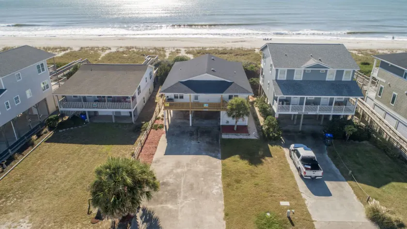 See why this is “Our Happy Place” in this pet-friendly, oceanfront home with a hot tub. - Image 1