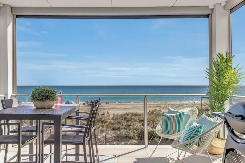 Hamptons-inspired Waterfront Living on Moana Beach - Image 1