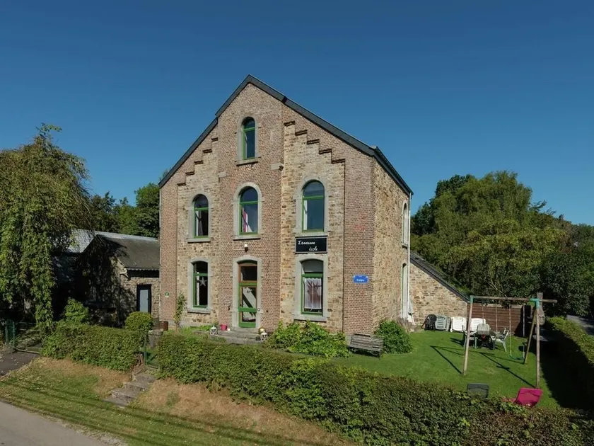 Old school in a pretty little village surrounded by forest - Image 1