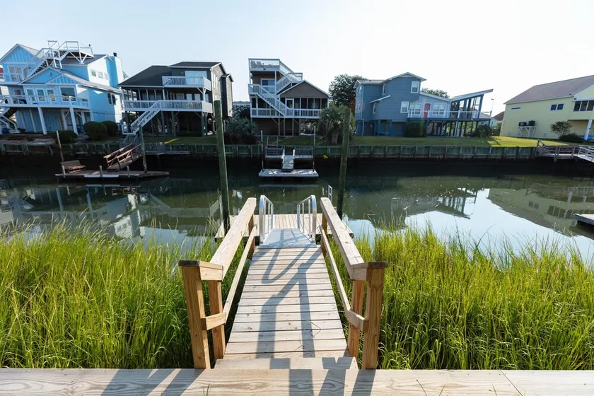 5 Star Sunset Beach canal home - Kayak, paddleboard, bring your boat & jetskis - Image 1