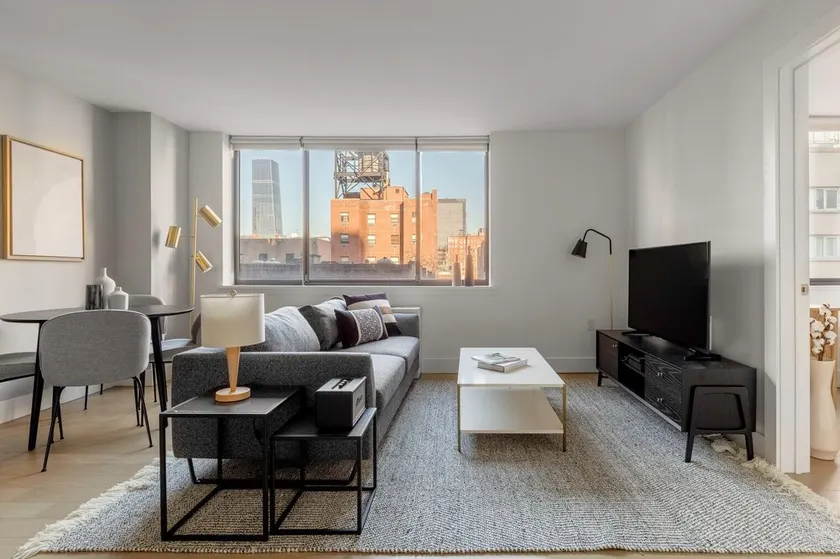 Bright Chelsea 1BR w/ Roofdeck, Doorman, BBQ, by Blueground - Image 1