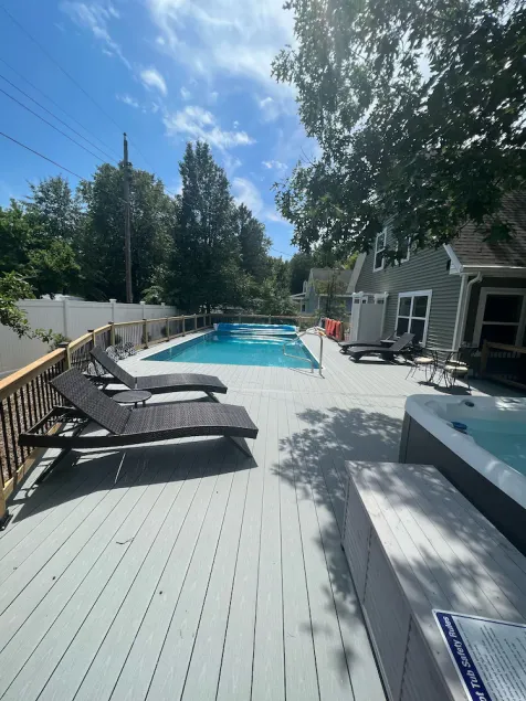 Spacious 5 bedroom home with private pool, hot tub & 10 minute walk to the beach - Image 1