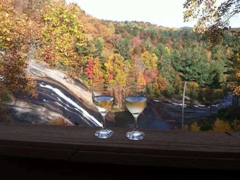 Stay directly above Toxaway Falls with breathtaking mountain views. - Image 1
