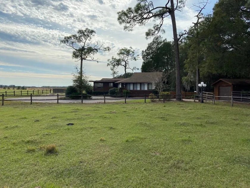 Former Hunting Lodge on 24 Acres with Lake with heated pool - Image 1