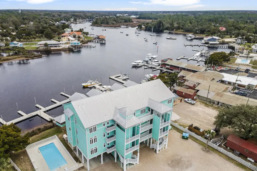 Fish, Scallop & Relax 👉 Waterfront Condo with Boat Slip + Elevator + Pool - Image 1