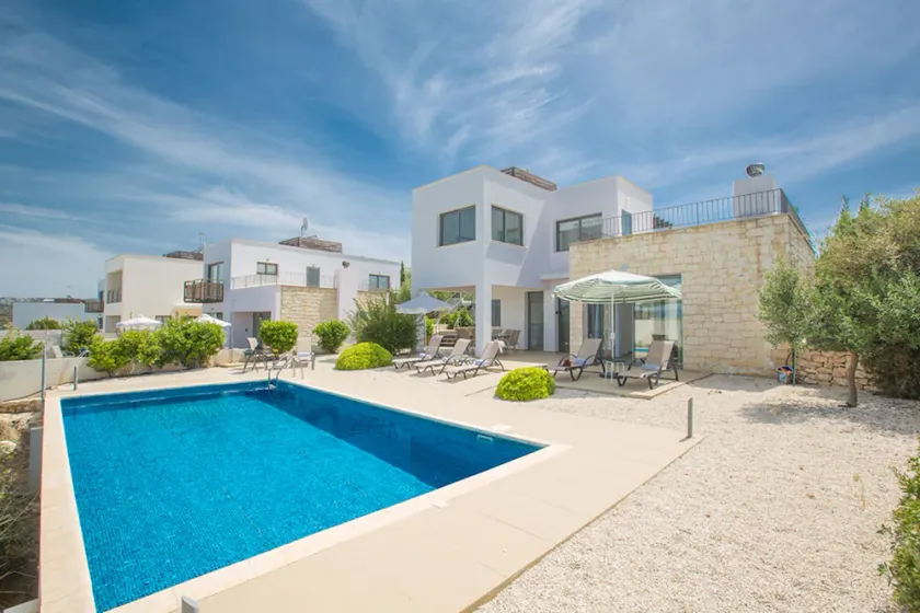 Picture Relaxing Beside Your Private Pool in Your Villa Reading Your Favourite Book - Image 1