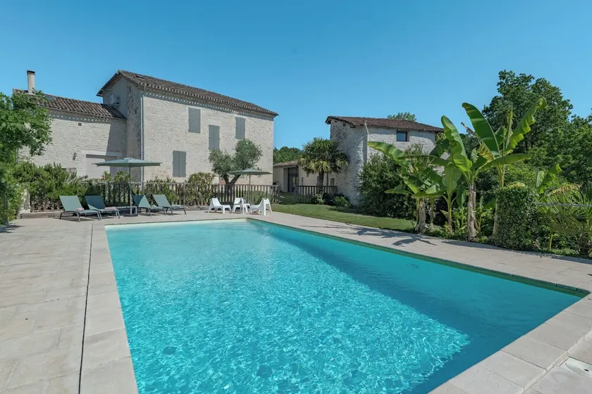 Castelneuve is a private home with a luxurious appearance and pool - Image 1