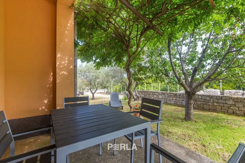 Apartment LYNA on the ground floor with garden in a quiet location 300m from the beach with crystal clear sea - Image 1