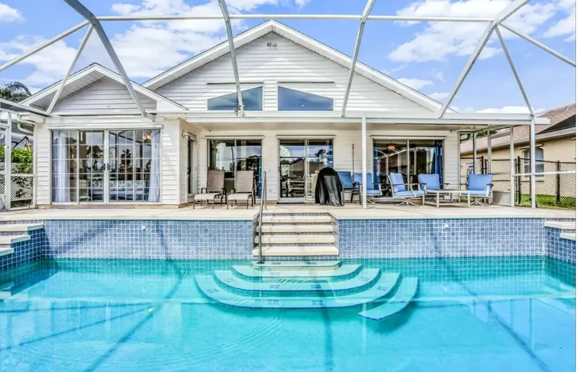 Peaceful Waterfront Pool Home home - Image 1