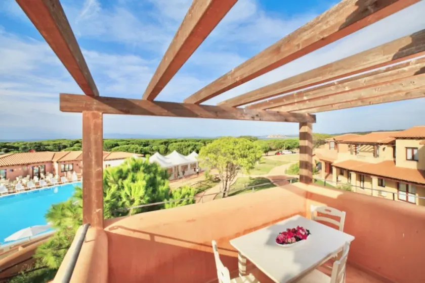 Studio apartment for 2 people of 27 m2 furnished in Sardinian style.Located on the ground floor with veranda and small garden or first floor with balcony.Composed of living room with kitchenette, 2 joinable single beds, bathroom.Endowed of:- TV- air cond - Image 1