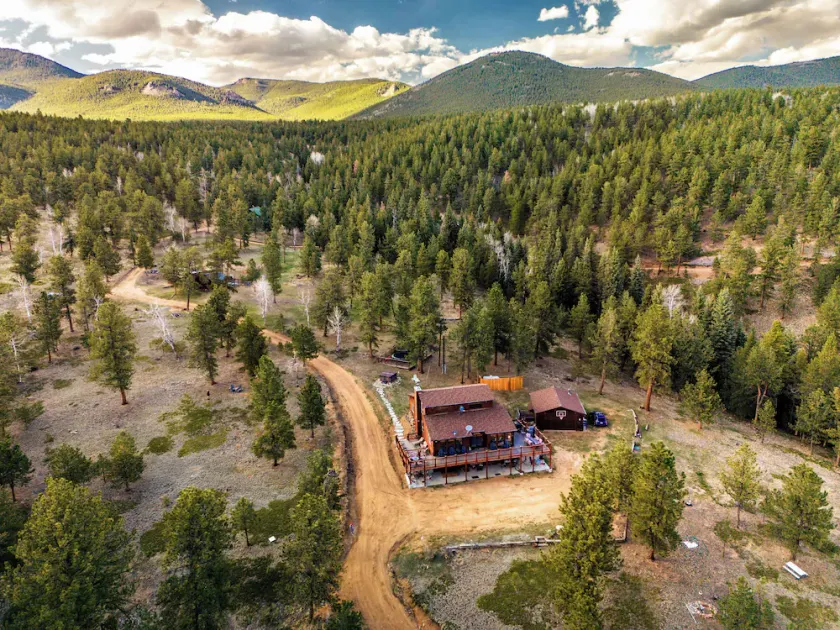 This is Colorado! Stunning views, killer hot tub, 12 acres, game barn+huge deck! - Image 1