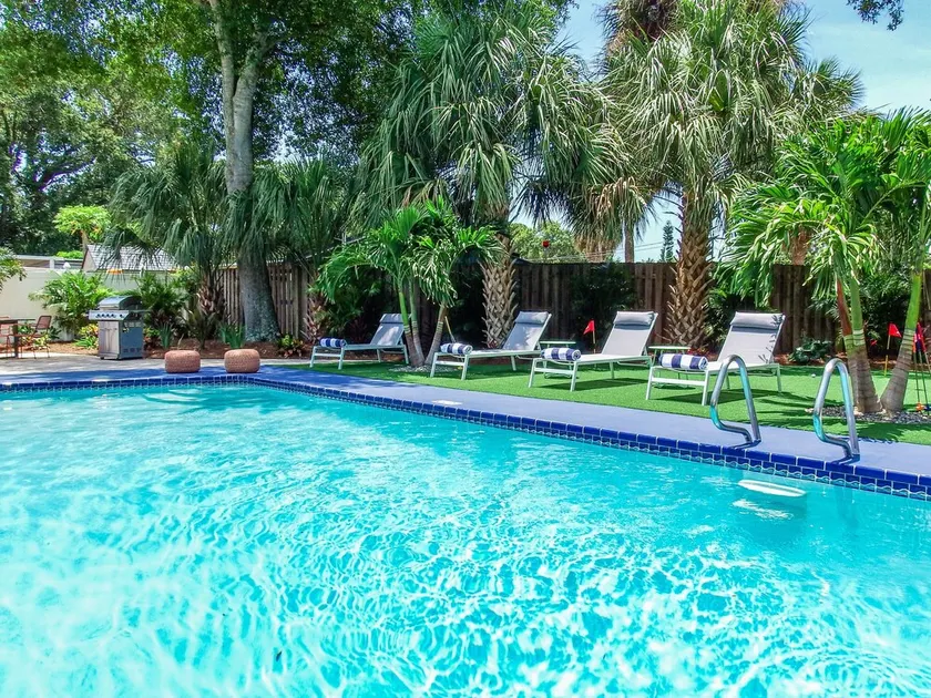Tropical Oasis - Heated Pool - Hot Tub - Downtown and Beaches - Image 1