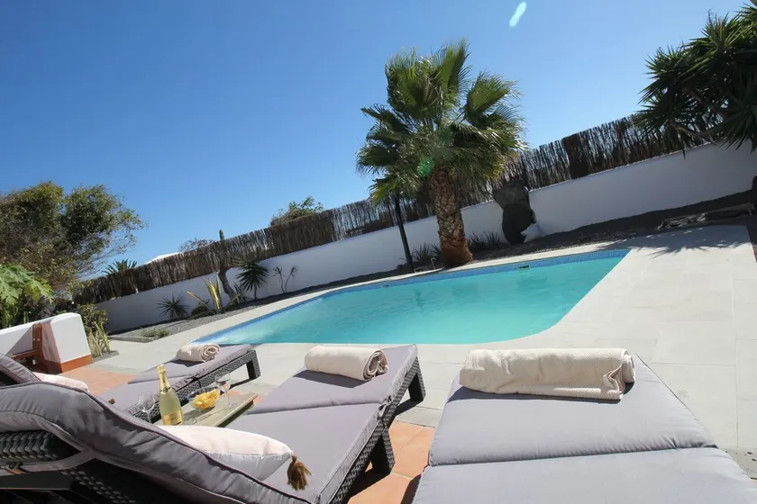 Stylish and serene south facing bungalow with private garden and pool. - Image 1
