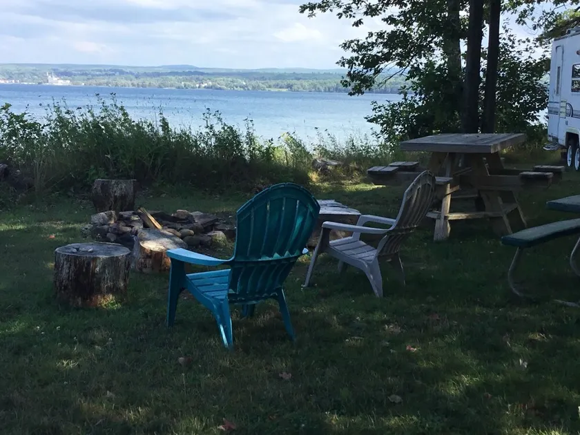 Get lulled to sleep by Lake Superior in Vintage camper 5 steps from the water - Image 1
