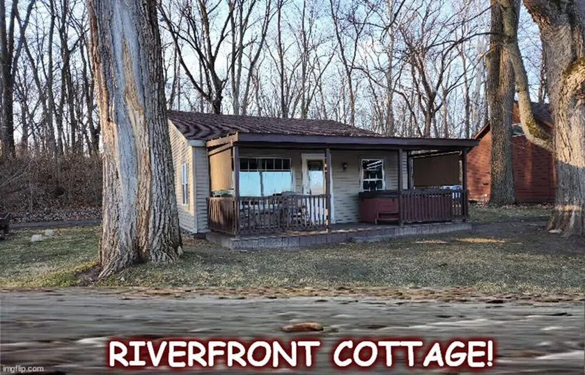 Riverfront Cottage with Hot Tub, Kayaks, Canoes, & Fishing Boats! - Image 1