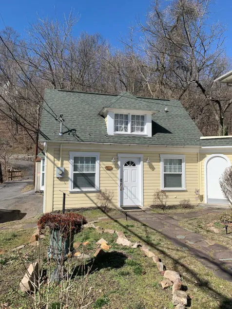 Brookside Cottage is a beautiful open concept doll house stay for two. - Image 1
