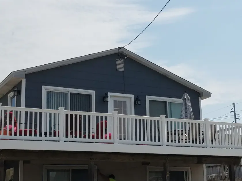 2nd Floor /Spacious deck to enjoy your sunset evenings after the beach, which is only a 3 block walk. - Image 1