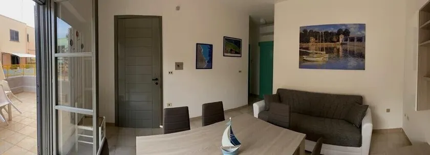 Apartamento en Torre dell'Orso con jardín y garaje a 300 metros de la playa. - Image 1
