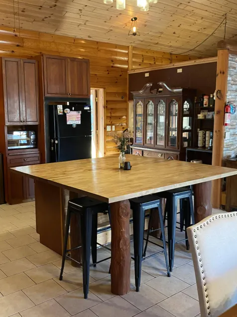 \tGorgeous 4BR Log Retreat on 40 Acres —Pond View – Mid-Michigan—sleeps 11+ - Image 1