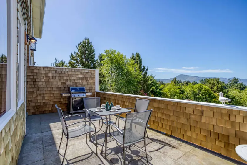 Modern Beauty on Private Street has Netarts Bay, Ocean Views, Putting Green! - Image 1
