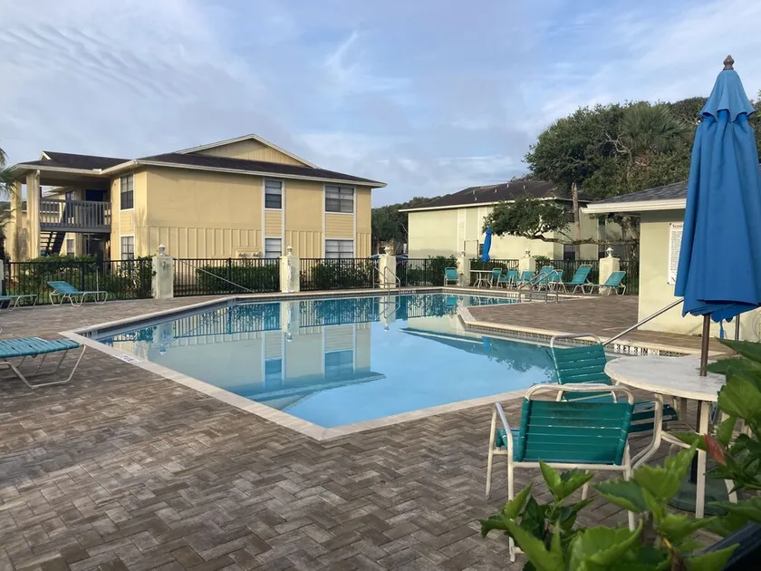 A + Location!  2 Bedroom/ 2 Bath Condo with pool/ stroll to beautiful beach - Image 1