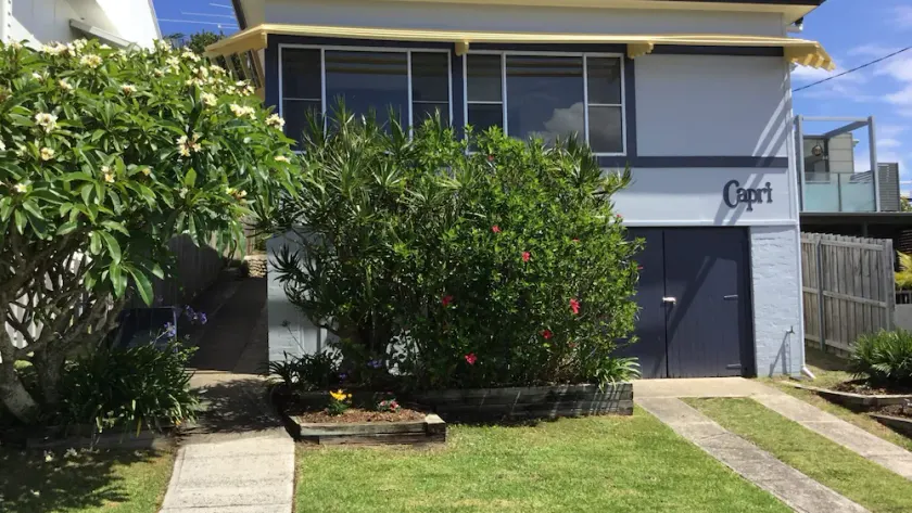 Cute, well-appointed beach house with ocean views and a short walk to all village amenities. - Image 1