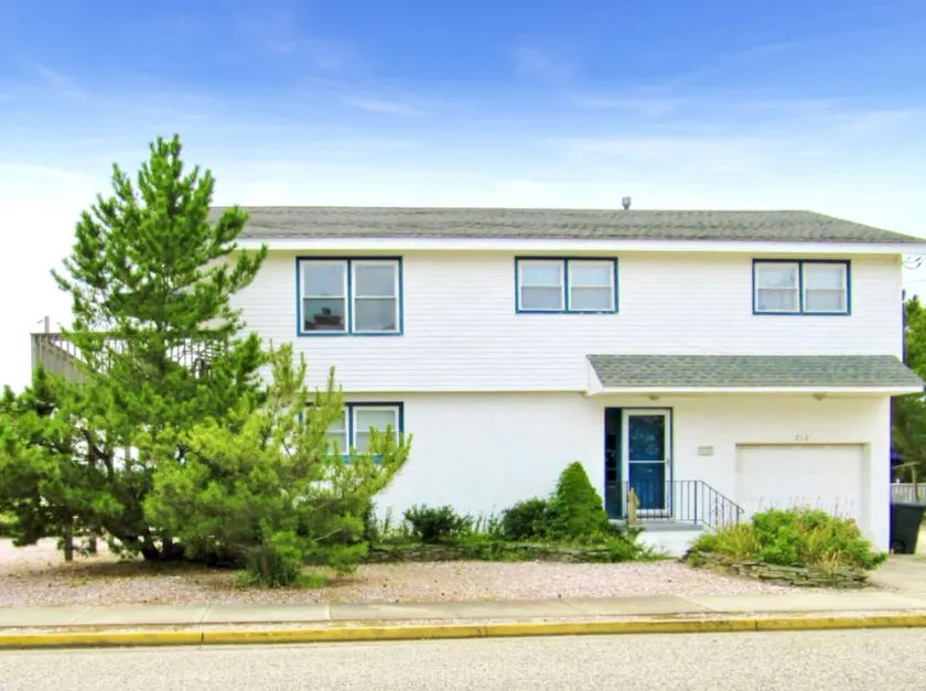 4 bedroom, 2 bath home is located in Avalon's north end and offers views of the inlet and the ocean from the large second floor deck. - Image 1