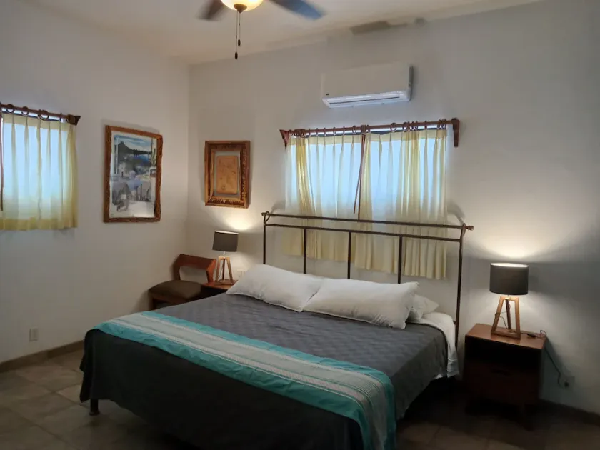 Room #6 Master with one king size bed, one double bed & one double bunk bed - Image 1