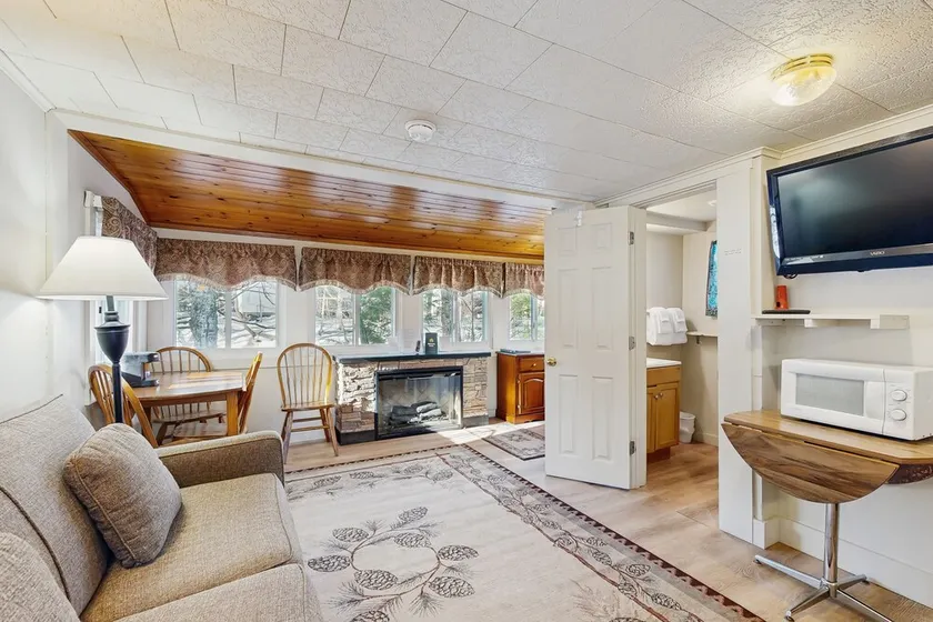 Cute Riverfront Cabin in Great Location w/ Shared Pool, Kitchenette, & Free WiFi - Image 1