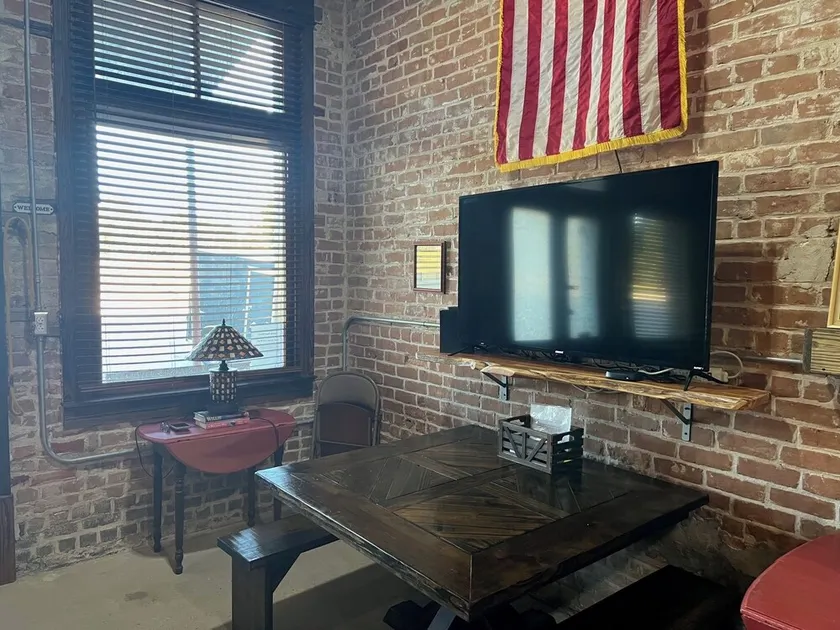 Unique 1870's building with outdoor space to relax - Image 1