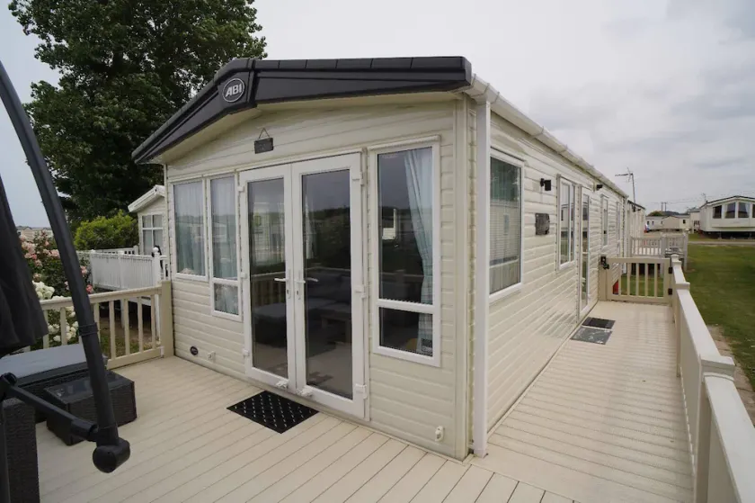 Stunning River View 2 Bedroom Caravan With Decking - Image 1