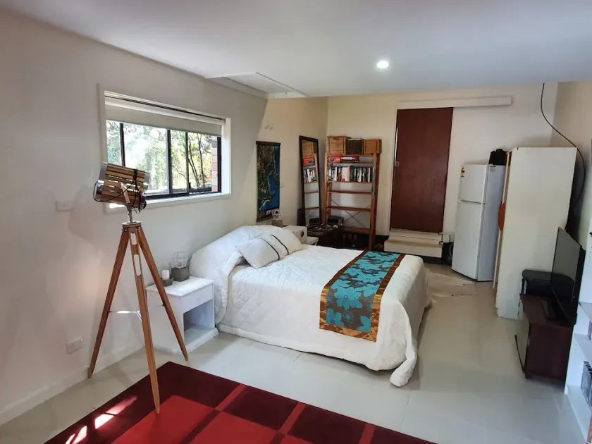Studio style self contained room, steps to the beach. - Image 1