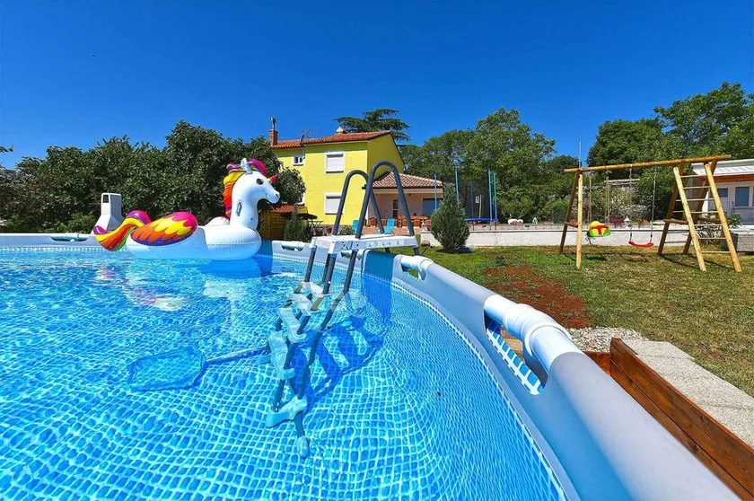 Villa with outdoor swimming pool and playground - Image 1