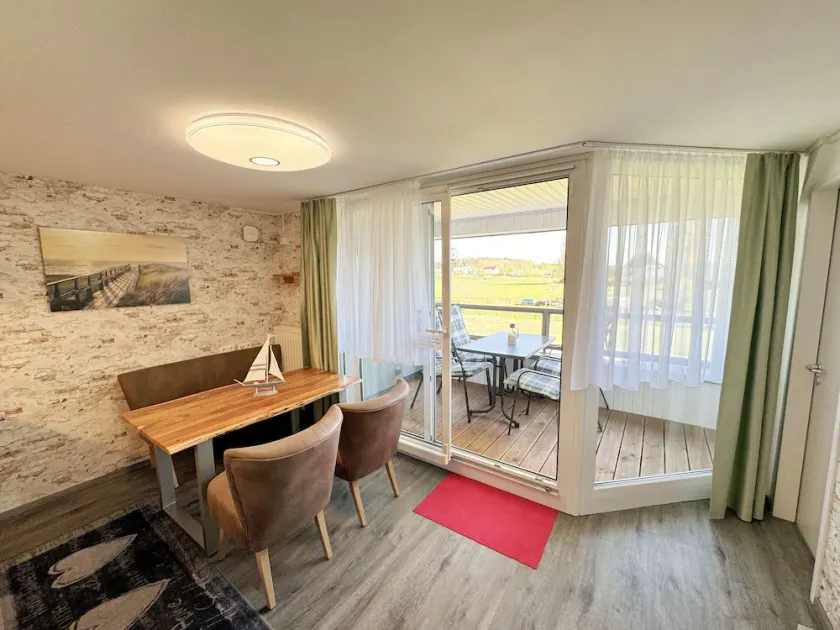 Wohnung 06 mit Balkon und Boddenblick - MR: Haus Inselperle mit Blick auf den - Image 1