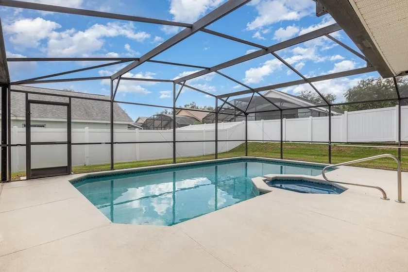 Orange Tree Pool Home with spa. Enjoy recreation and relaxation in this inviting community near the best of Orlando's hot spots! - Image 1