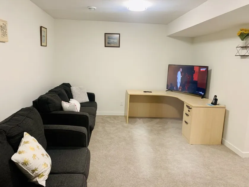 Centrally located, Cozy two bedroom basement apartment, 10 mins from YYC airport - Image 1