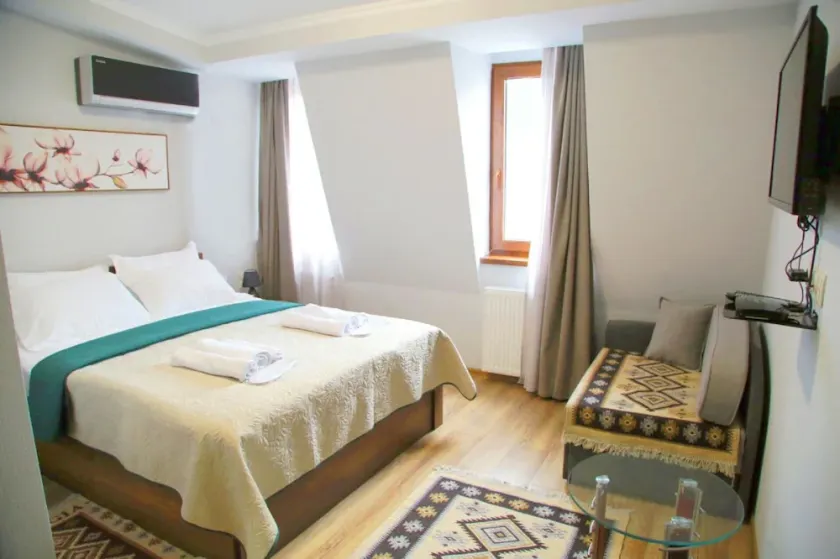 Suite 2 with one double bed with sofa bed - Image 1