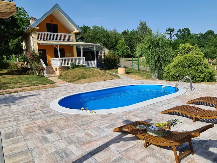 Country house with swimming pool surrounded by pure nature  - Image 1