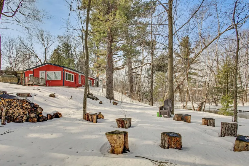 Group Friendly! Riverfront Waupaca Retreat w/ Yard - Image 1