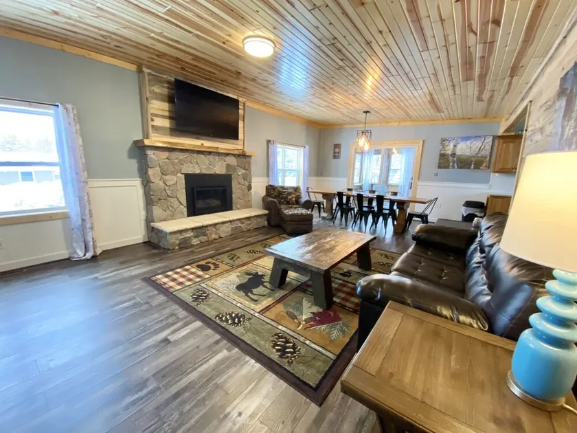 Snowmobile Friendly! Ample Parking-only 1 block to trail! Clean w cozy Fireplace - Image 1