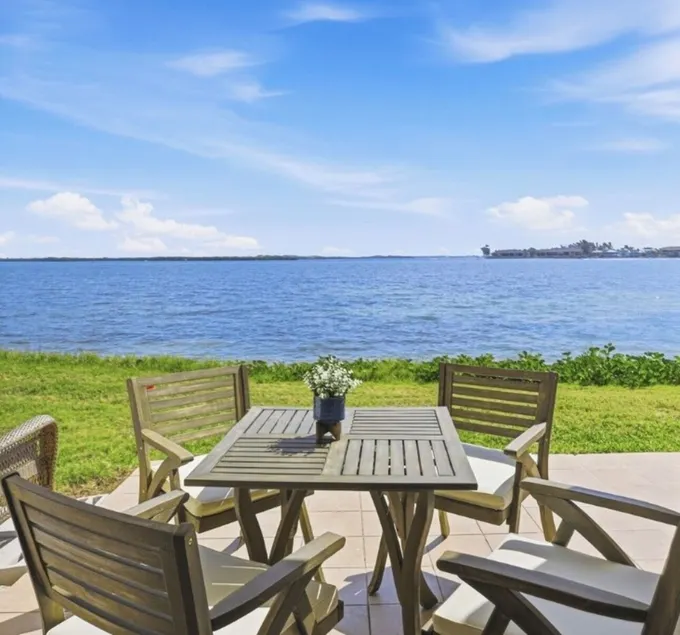 Watch dolphins & pelicans from this 2 bedroom/2 bath waterfront condo. - Image 1