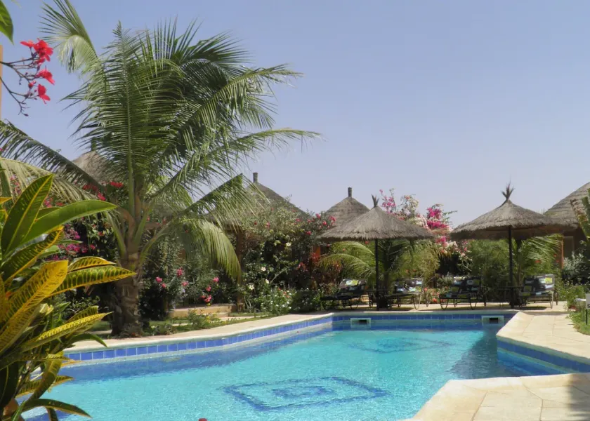 African hut comfort on estate with pool - Image 1
