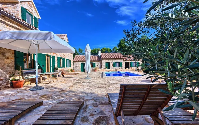 Finca Hvar - 3 individual houses, 5 bedrooms, bicycles for all, and a pool by MyWaycation - Image 1