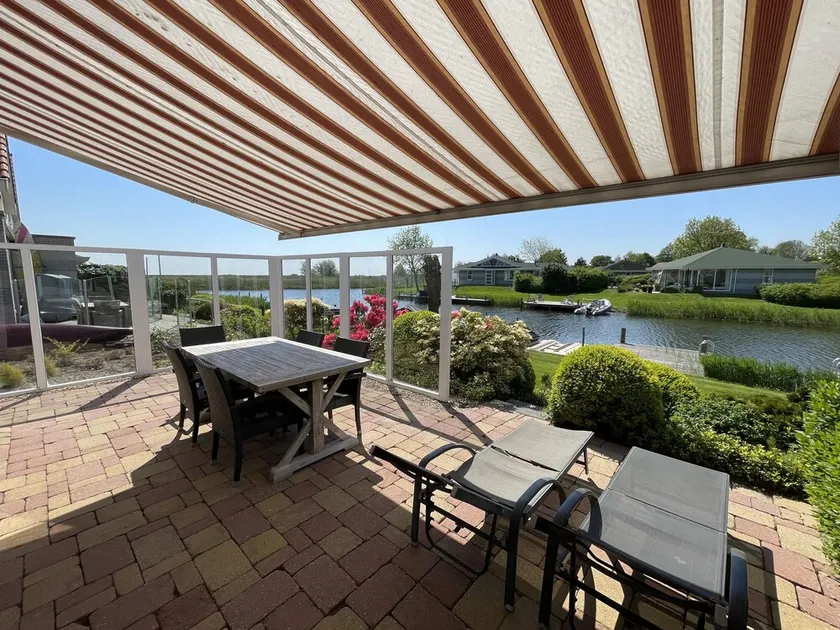 Gemütliches Ferienhaus mit Sauna und eigenem Bootssteg - Image 1