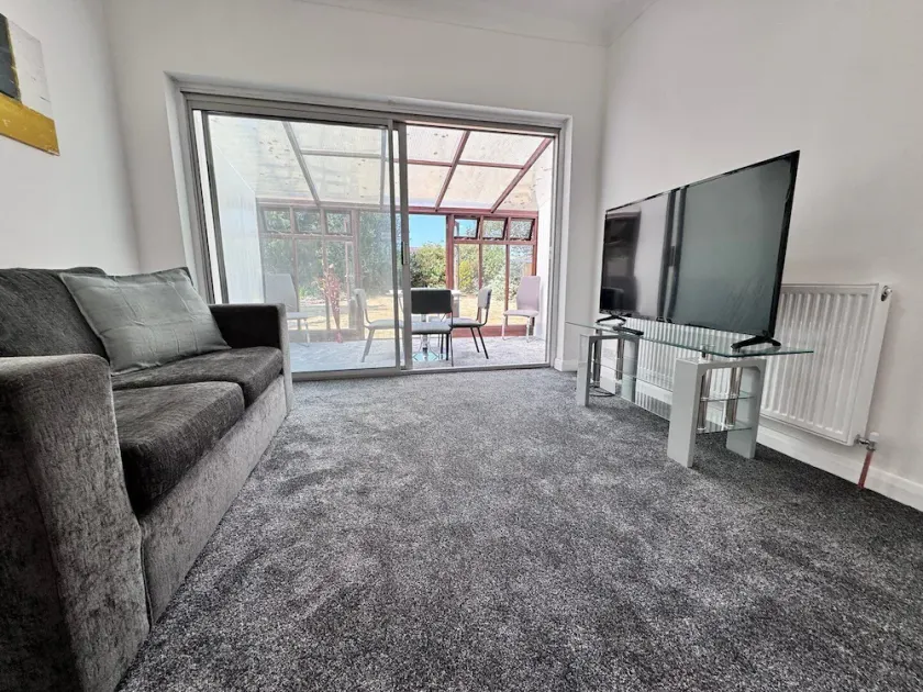 NEAR AIRPORT Fully Detached Home with 2 Off-Street Parking Spaces - Image 1