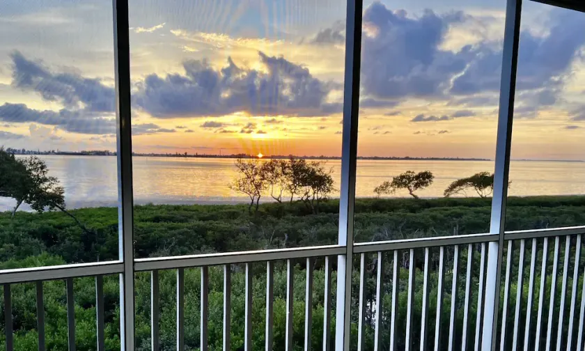 NEW LISTING- Bayfront View of Amazing Sunsets over Anna Maria Island - Image 1