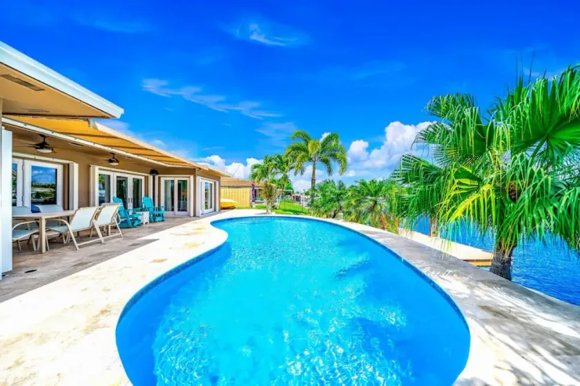 EXQUISITE HEATED POOL+WATERFRONT! 1 MILE TO BEACH! - Image 1