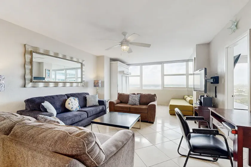 Sunlit suite with a city view & fast WiFi plus a pool, & beach access - Image 1