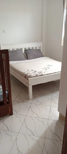 It's an apartment with necessary amenities including a gym - Image 1
