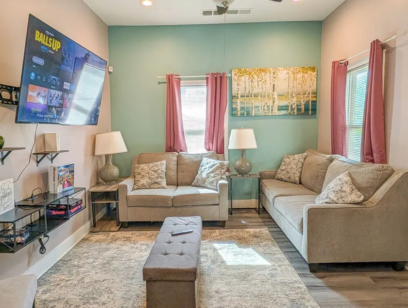 Lovely 4BR Home with King Bed Sleeps 8 & Free Parking - Image 1
